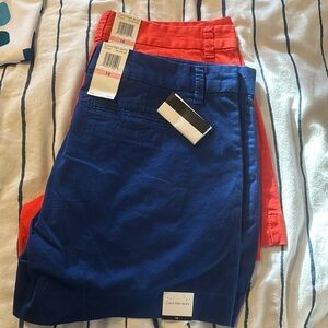 Calvin Klein blue and orange shorts approx 5 inch inseam size 10